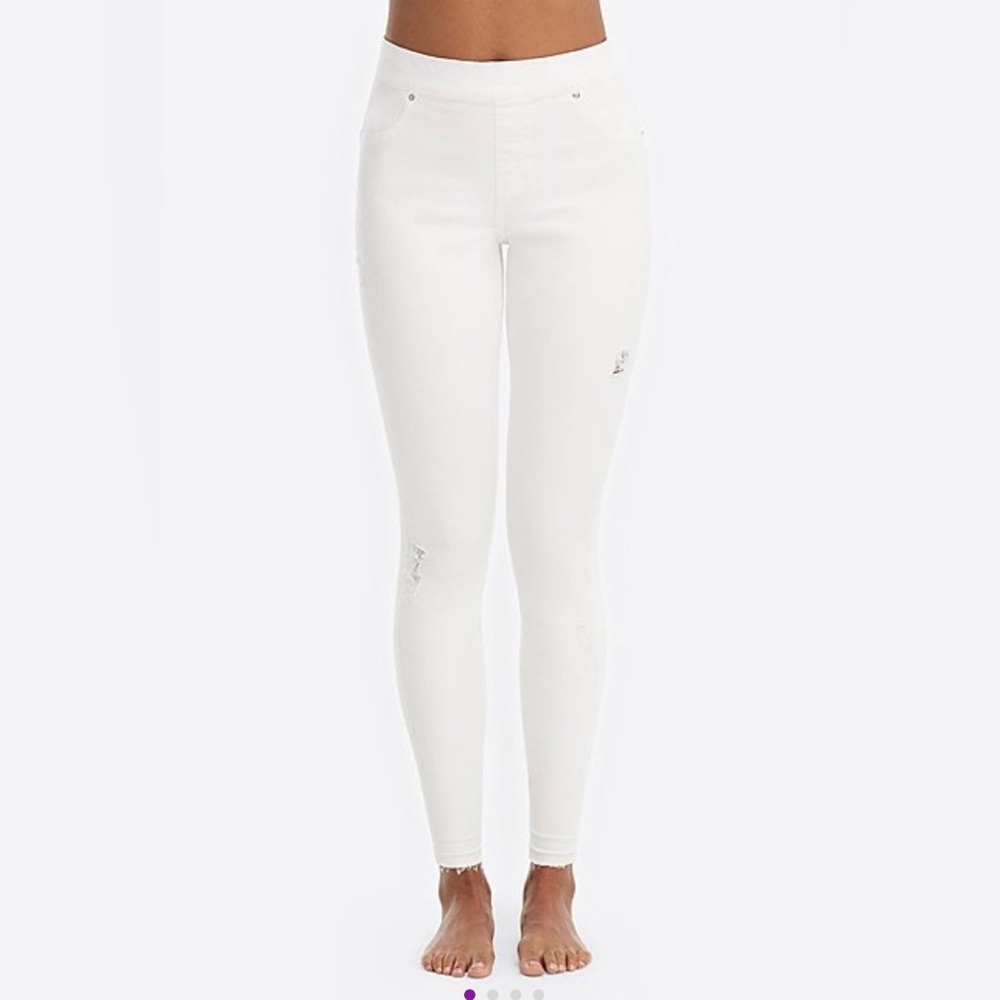 SPANX distressed skinny jeans.